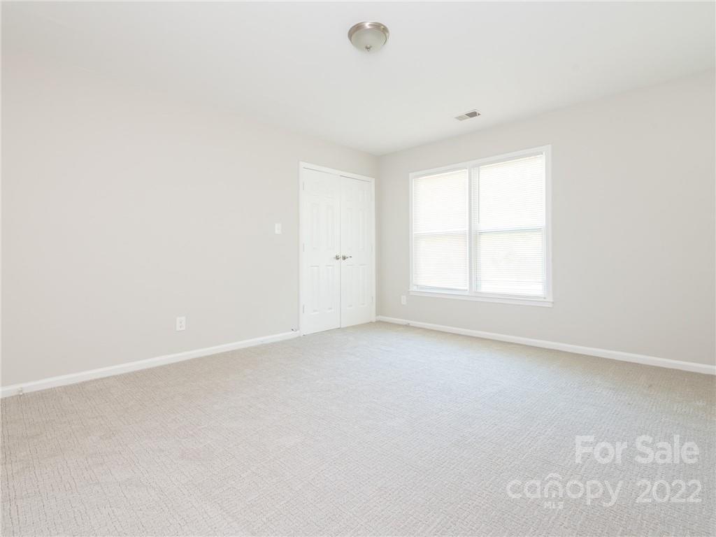 826 McAlway Road Charlotte, NC 28211 - Photo 12 of 30 an empty room with a window