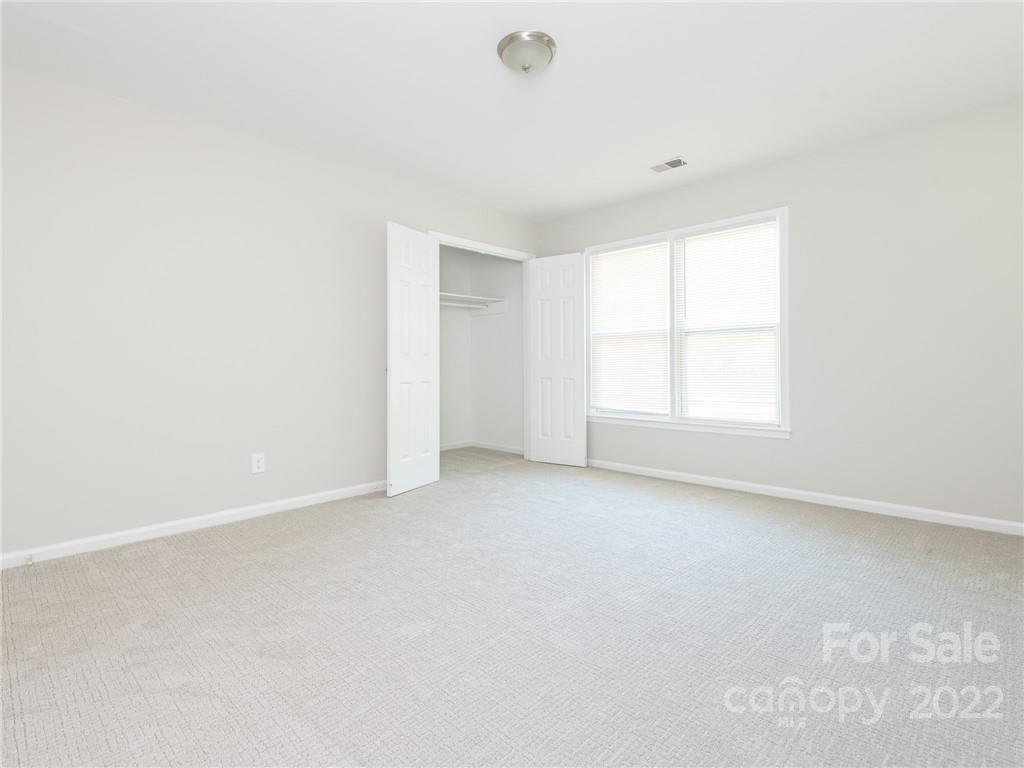 826 McAlway Road Charlotte, NC 28211 - Photo 13 of 30 an empty room with windows
