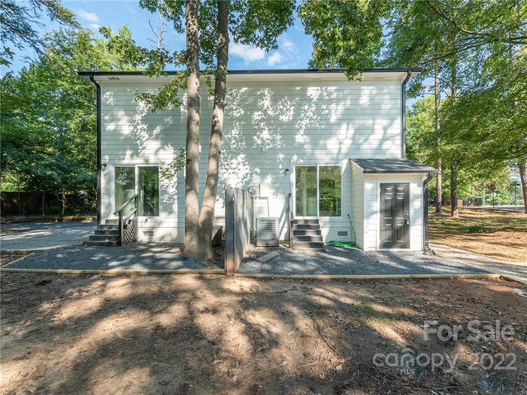 826 McAlway Road Charlotte, NC 28211 - Photo 14 of 30 a view of a house with backyard and garden