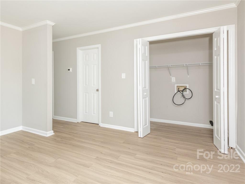 826 McAlway Road Charlotte, NC 28211 - Photo 20 of 30 a view of room with wooden floor