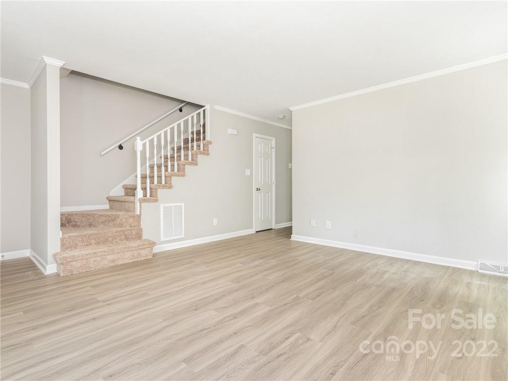 826 McAlway Road Charlotte, NC 28211 - Photo 21 of 30 a view of entryway and hall with wooden floor