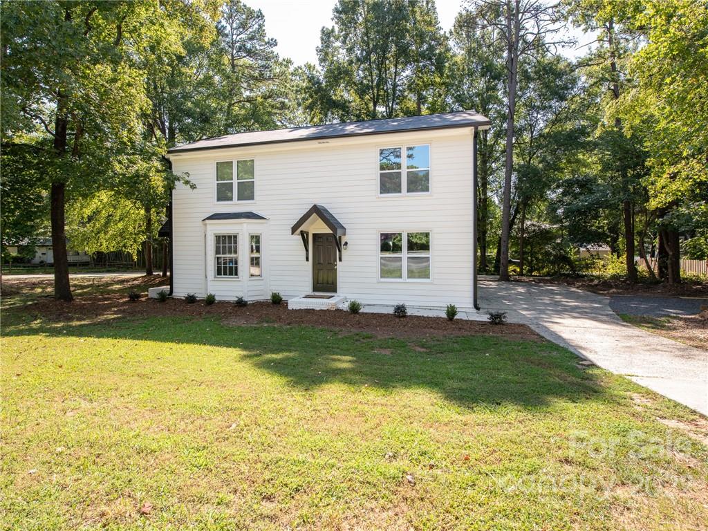 826 McAlway Road Charlotte, NC 28211 - Photo 30 of 30 a view of a white house with a swimming pool