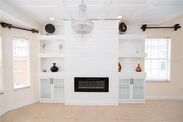 a view of a livingroom with furniture and window