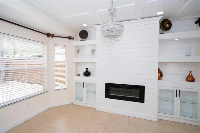 a view of a livingroom with furniture and window