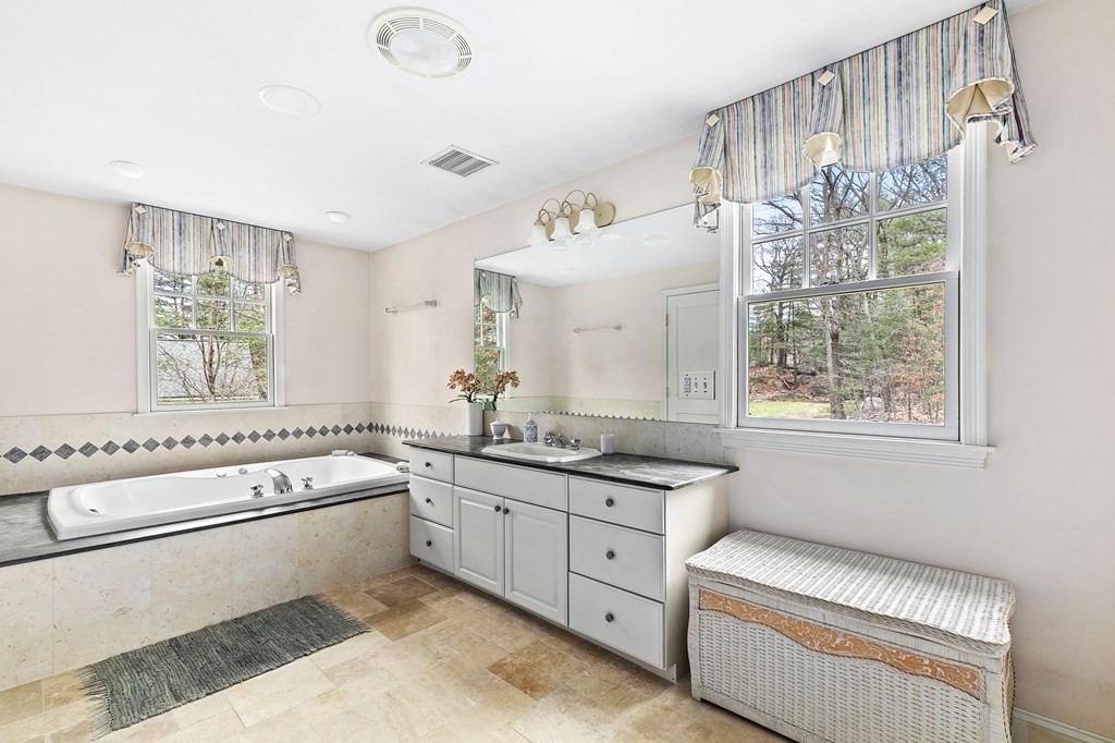 59 Crestview Road Milton, MA 02186 - Photo 12 of 32 a bathroom with a granite countertop sink mirror and window