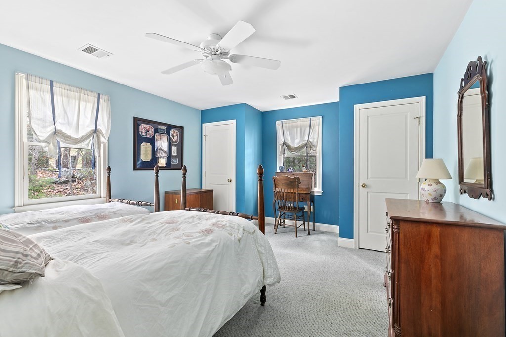 59 Crestview Road Milton, MA 02186 - Photo 16 of 32 a bedroom with a bed a large window with table and chairs