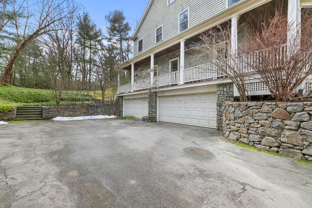 59 Crestview Road Milton, MA 02186 - Photo 26 of 32 a view of backyard with wooden fence