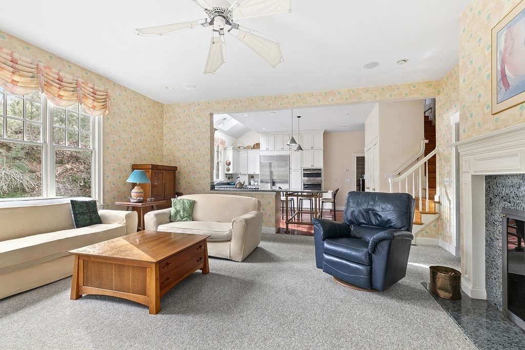 59 Crestview Road Milton, MA 02186 - Photo 7 of 32 a living room with fireplace furniture and a large window
