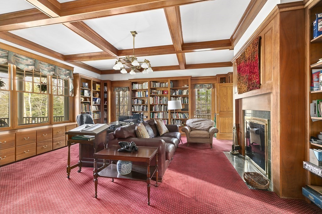 59 Crestview Road Milton, MA 02186 - Photo 8 of 32 a living room with furniture and a large window