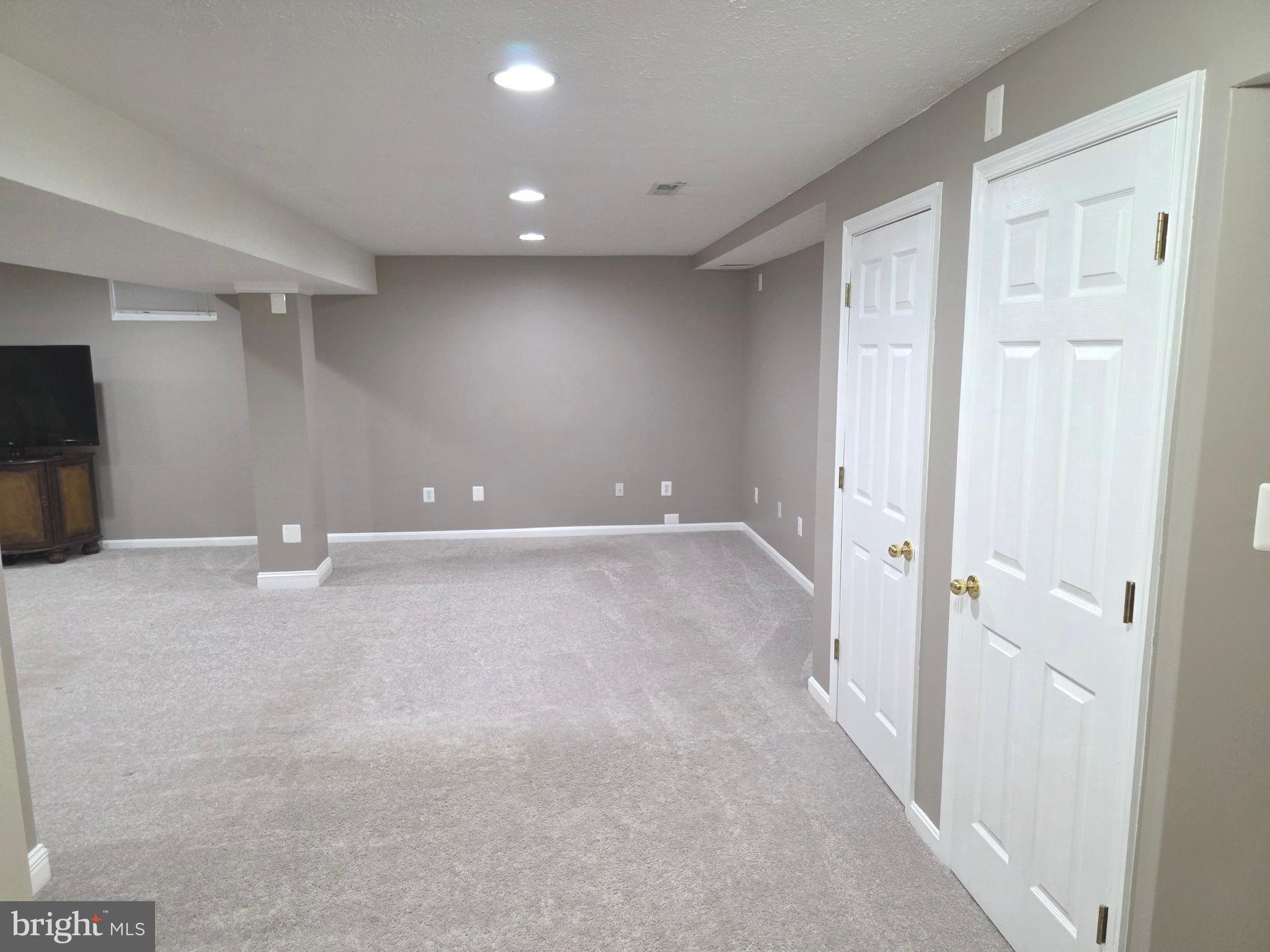 2441 Kemper Road Crofton, MD 21114 - Photo 53 of 63 a view of a livingroom with an empty space
