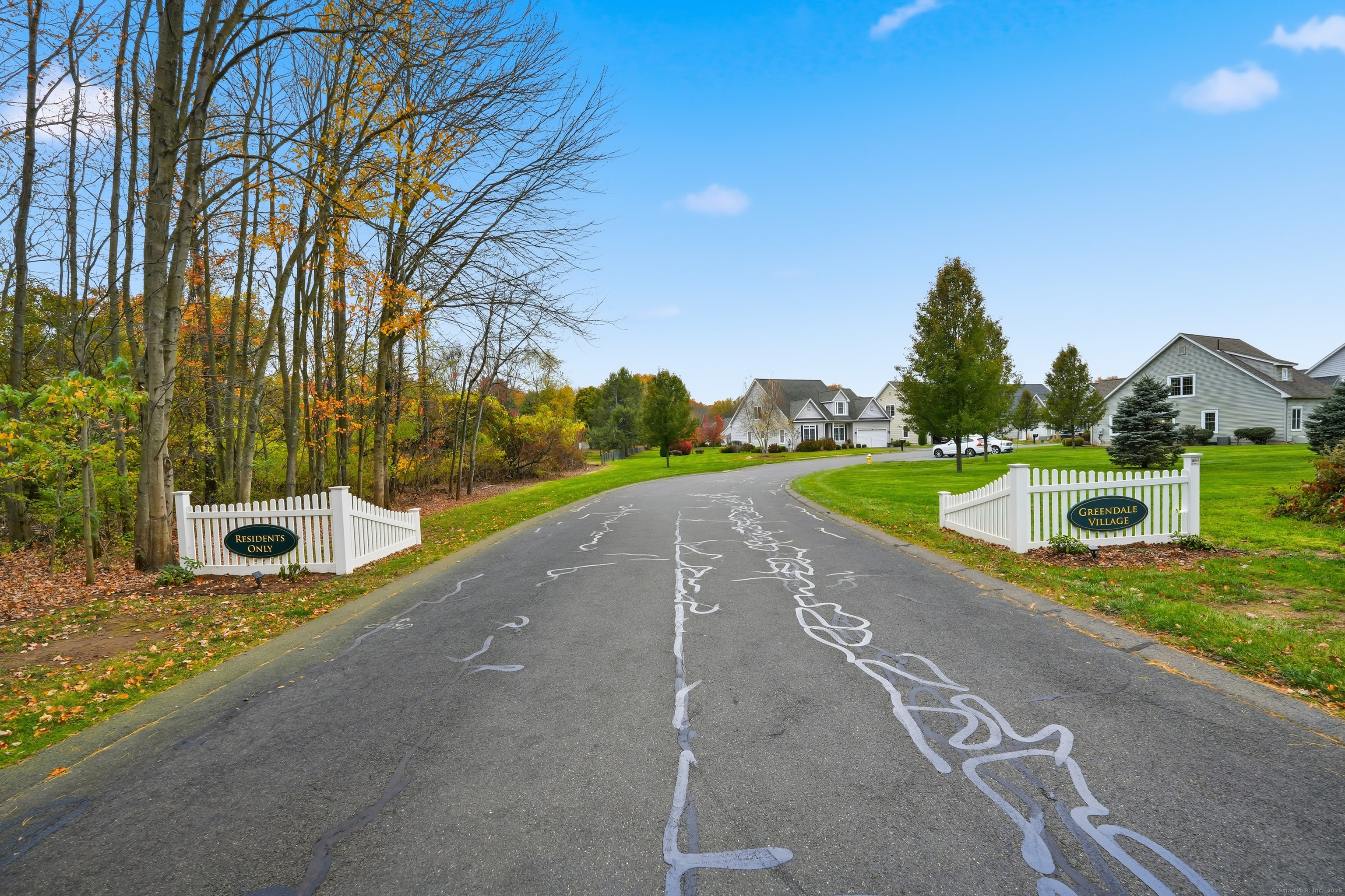 20 Greendale Drive Suffield, CT 06078 - Photo 35 of 36 a view of a street with a yard and a fountain