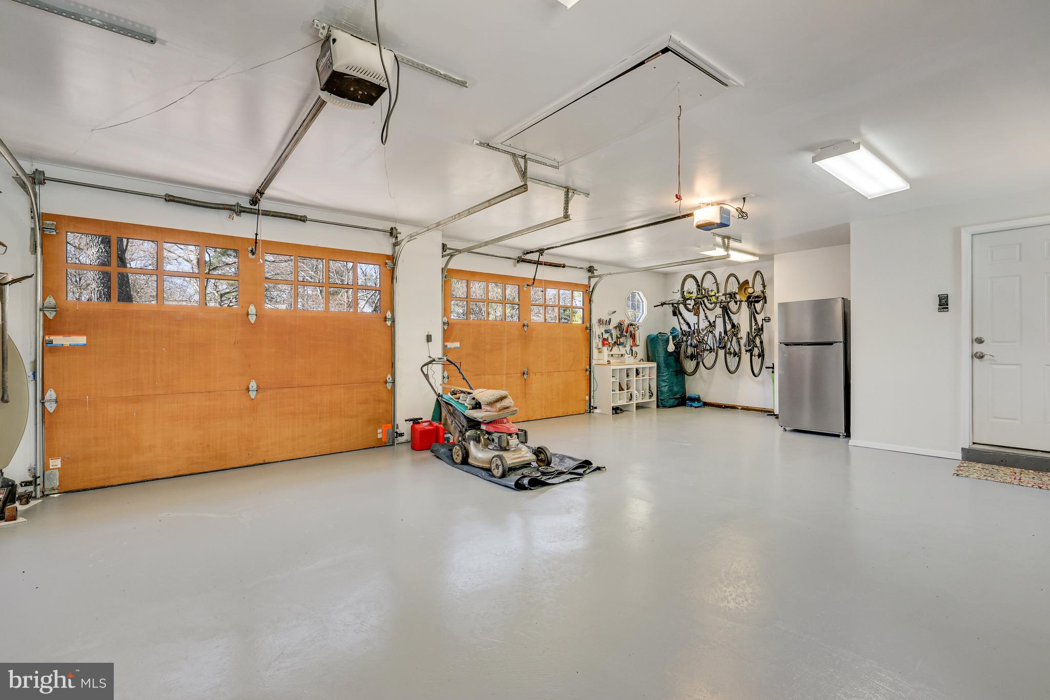 1807 Post Oak Trail Reston, VA 20191 - Photo 14 of 79 Spacious 2-car garage with attic access.