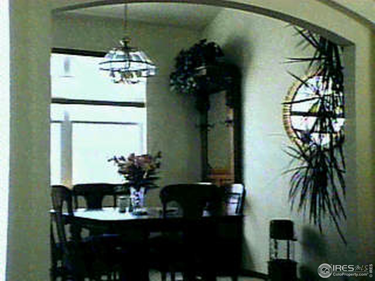 569 Rider Ridge Drive Longmont, CO 80504 - Photo 3 of 3 a view of a dining room with a table and chairs