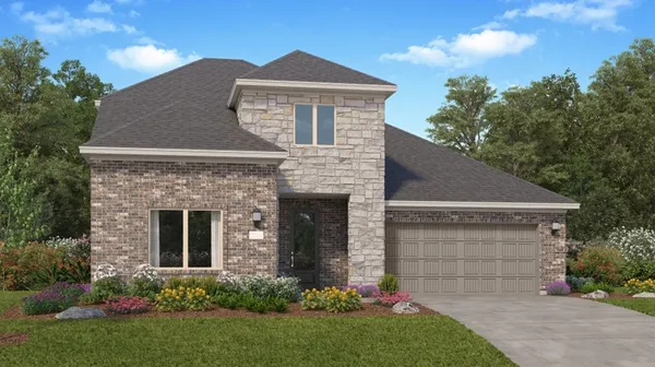 a front view of a house with yard