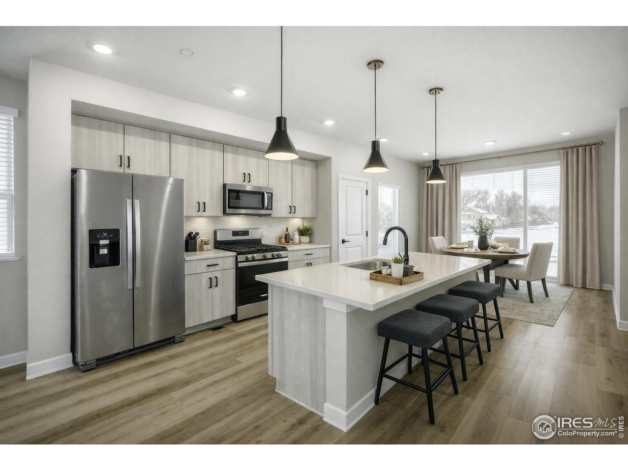 2385 East Suniga Road Fort Collins, CO 80524 - Photo 6 of 28 Chef's kitchen featuring upgraded appliances