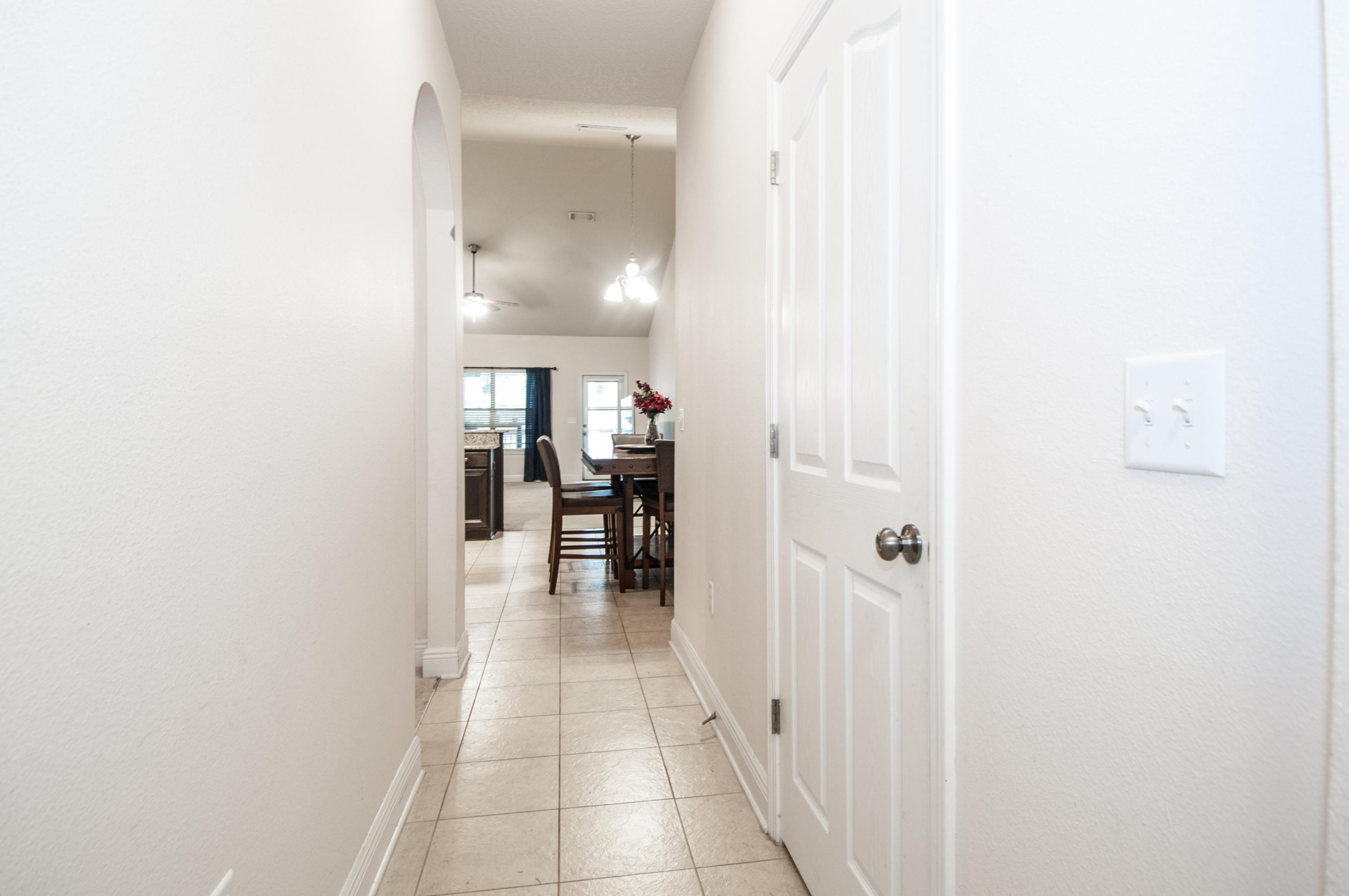 93 Mango Lane Freeport, FL 32439 - Photo 21 of 45 a view of a hallway with wooden floor