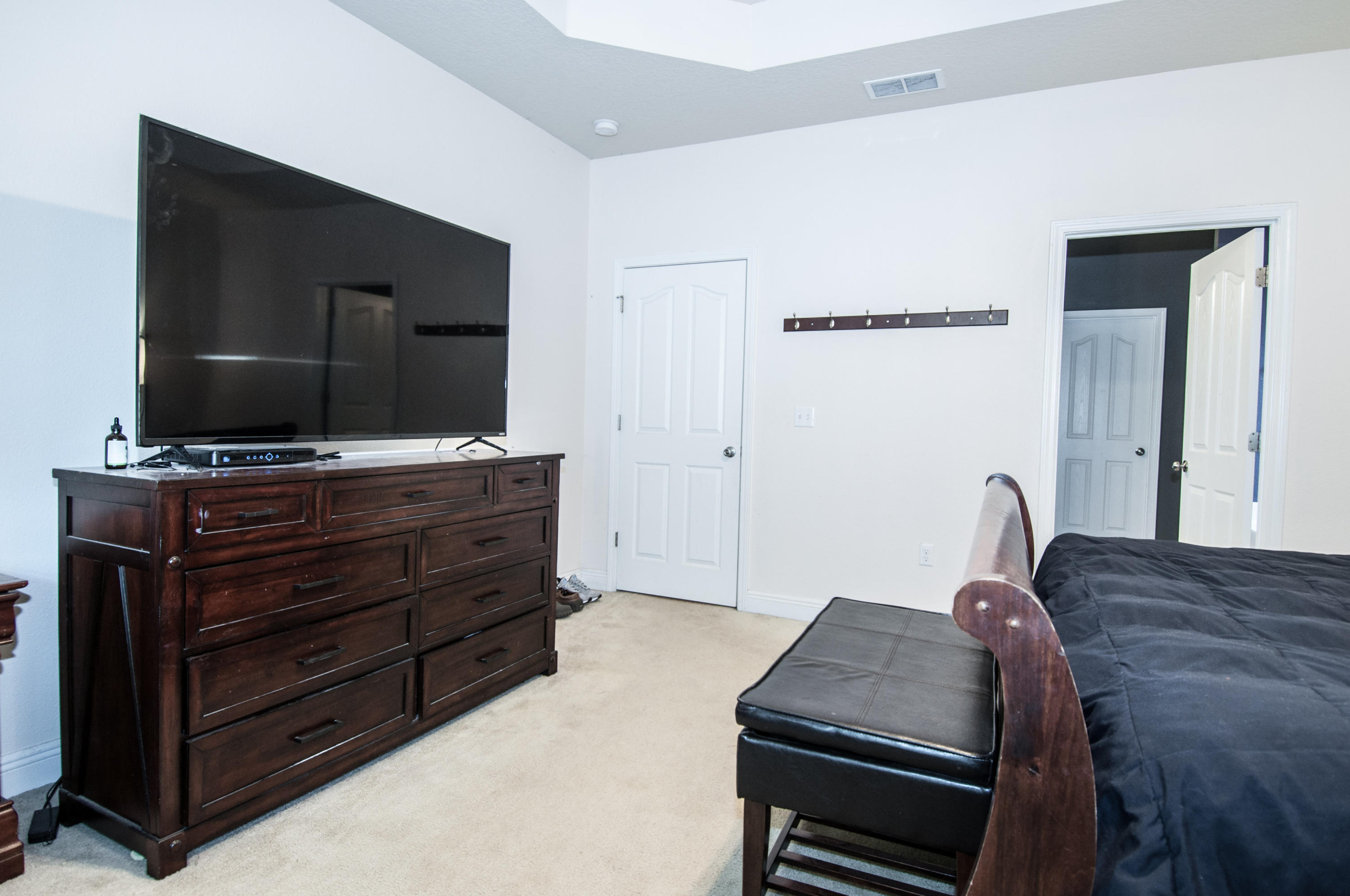 93 Mango Lane Freeport, FL 32439 - Photo 34 of 45 a room with furniture and flat screen tv