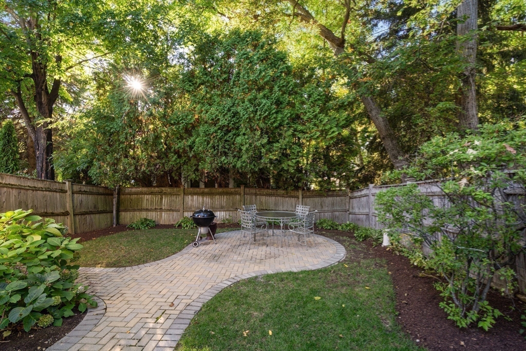 5 Halcyon Road Newton, MA 02459 - Photo 24 of 26 a view of a backyard with furniture
