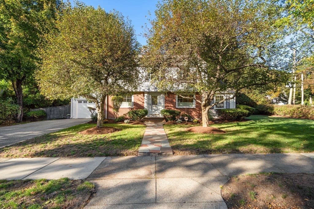 5 Halcyon Road Newton, MA 02459 - Photo 25 of 26 a front view of a house with a yard