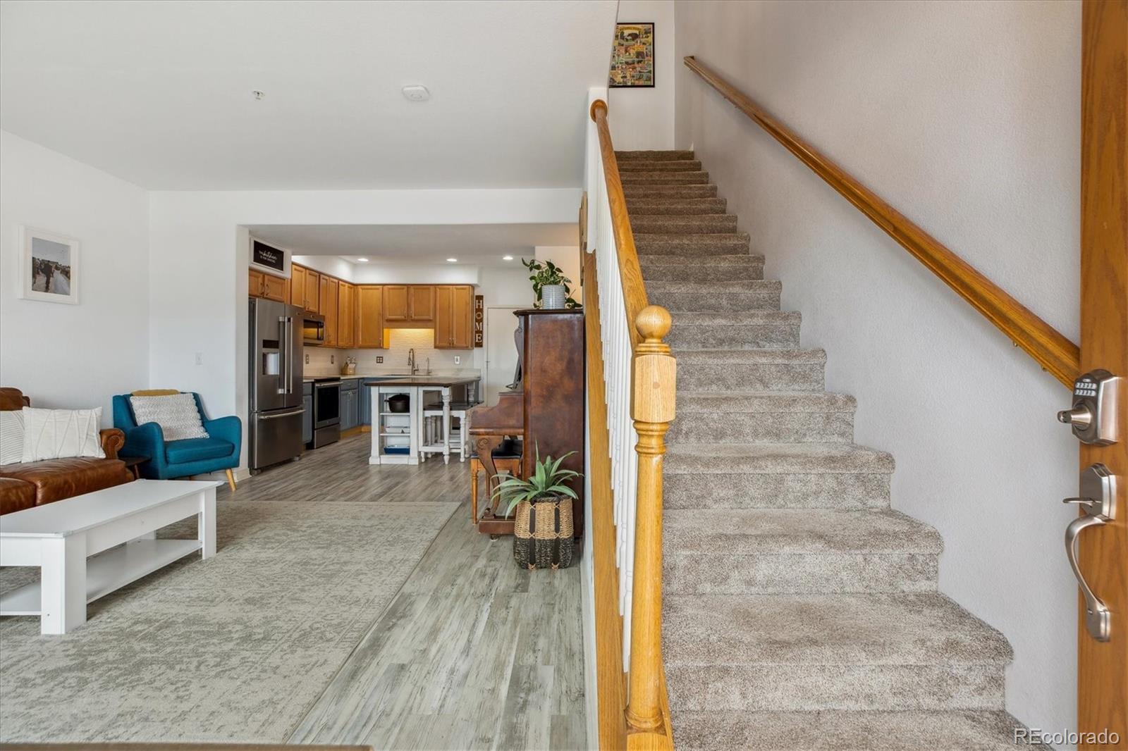 645 Yuma Loop, Unit 103 Kiowa, CO 80117 - Photo 4 of 23 a view of entryway and hall