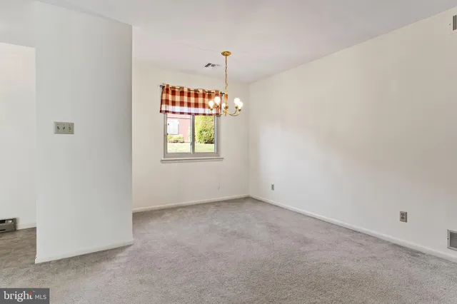 an empty room with window