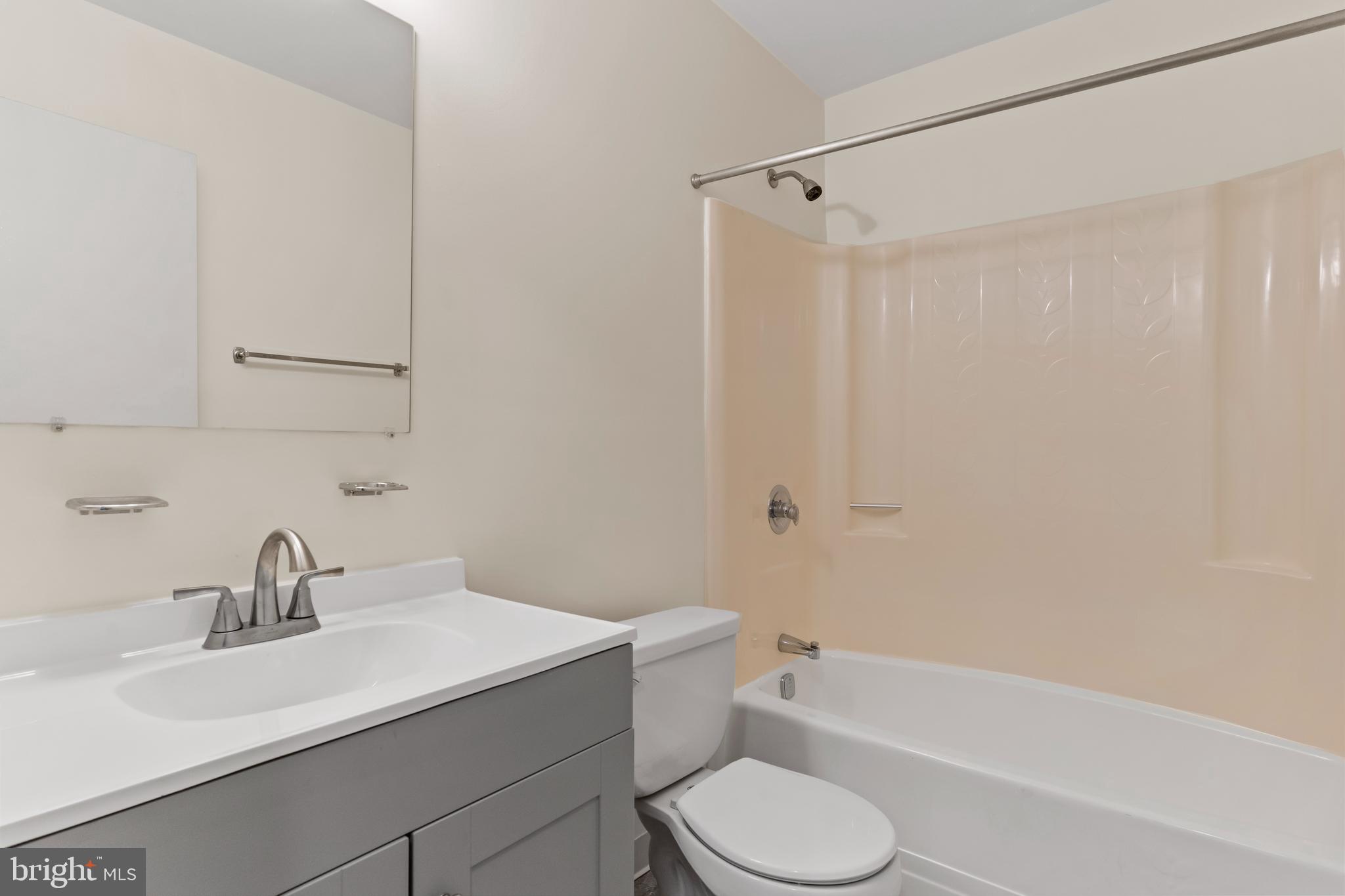 819 Brian Drive Enola, PA 17025 - Photo 17 of 22 a bathroom with a sink toilet and shower