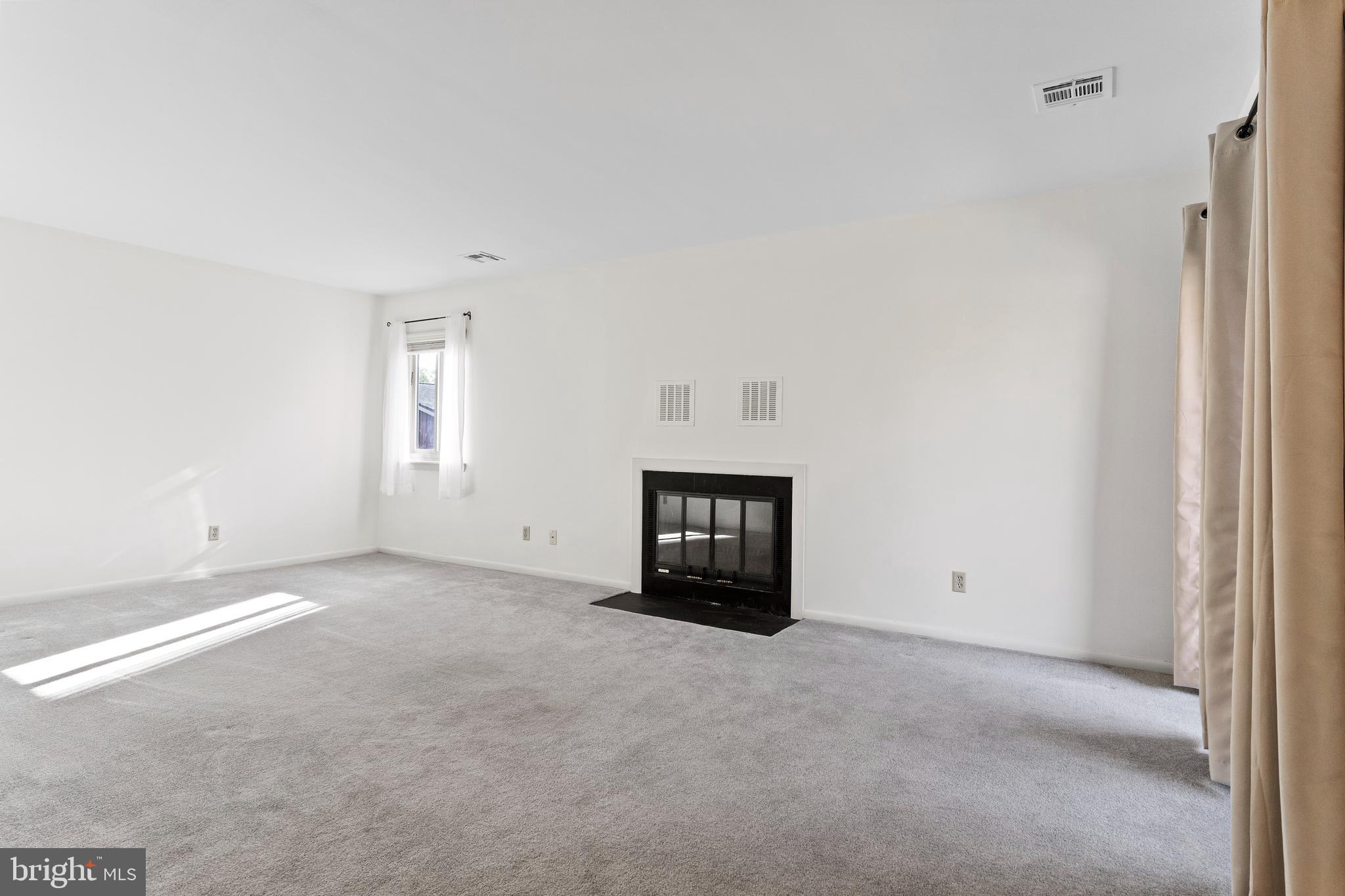 819 Brian Drive Enola, PA 17025 - Photo 3 of 22 a view of an empty room with a window