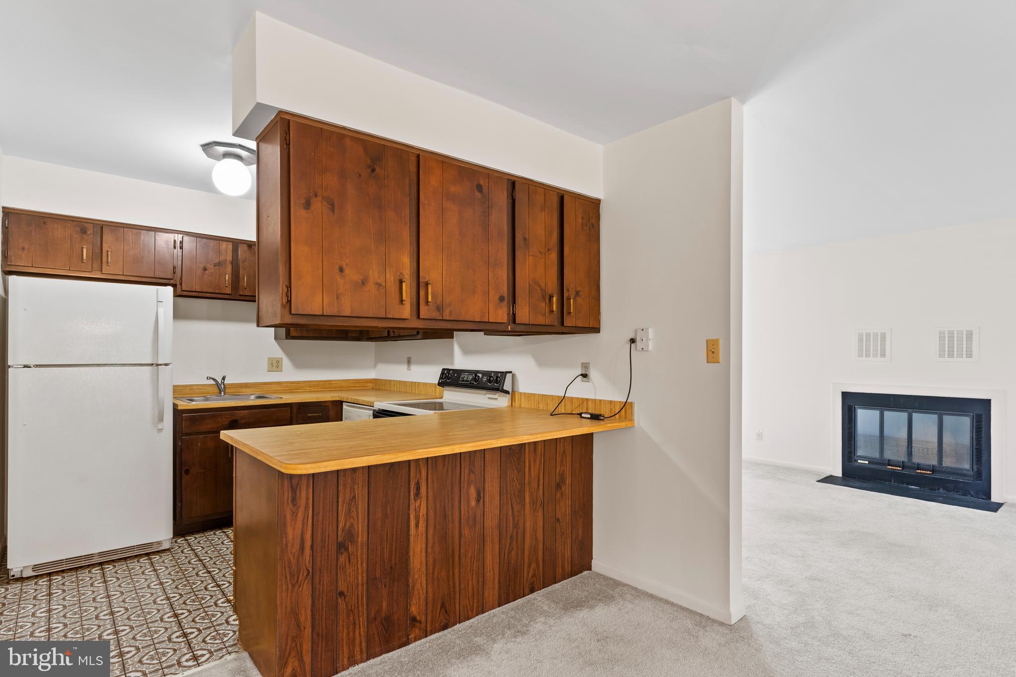 819 Brian Drive Enola, PA 17025 - Photo 8 of 22 a kitchen with a appliances a sink and a cabinets