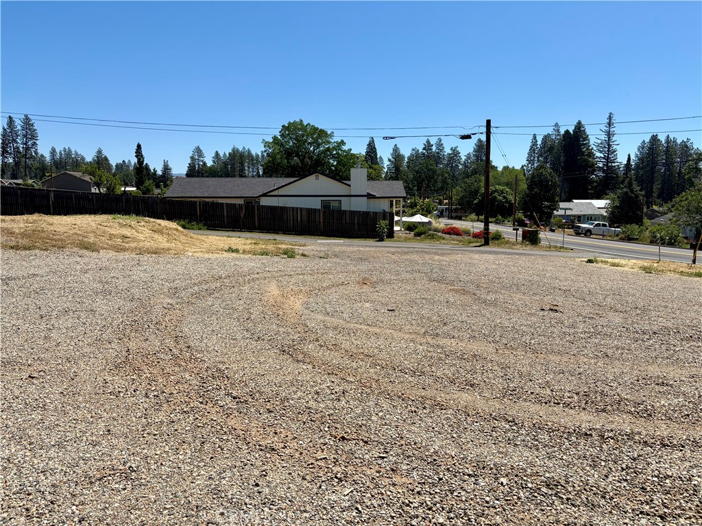 1123 Bille Road Paradise, CA 95969 - Photo 7 of 12 a view of swimming pool and trees in the background