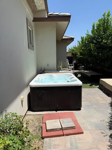 a view of table and chairs in the patio