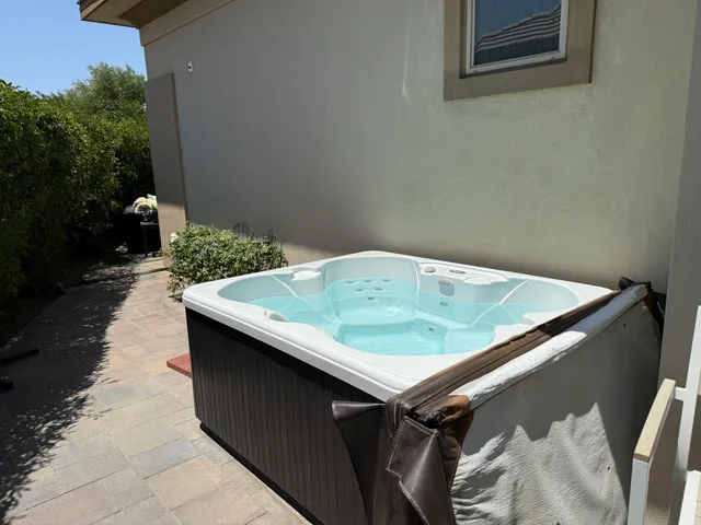 a view of a garden with a bench