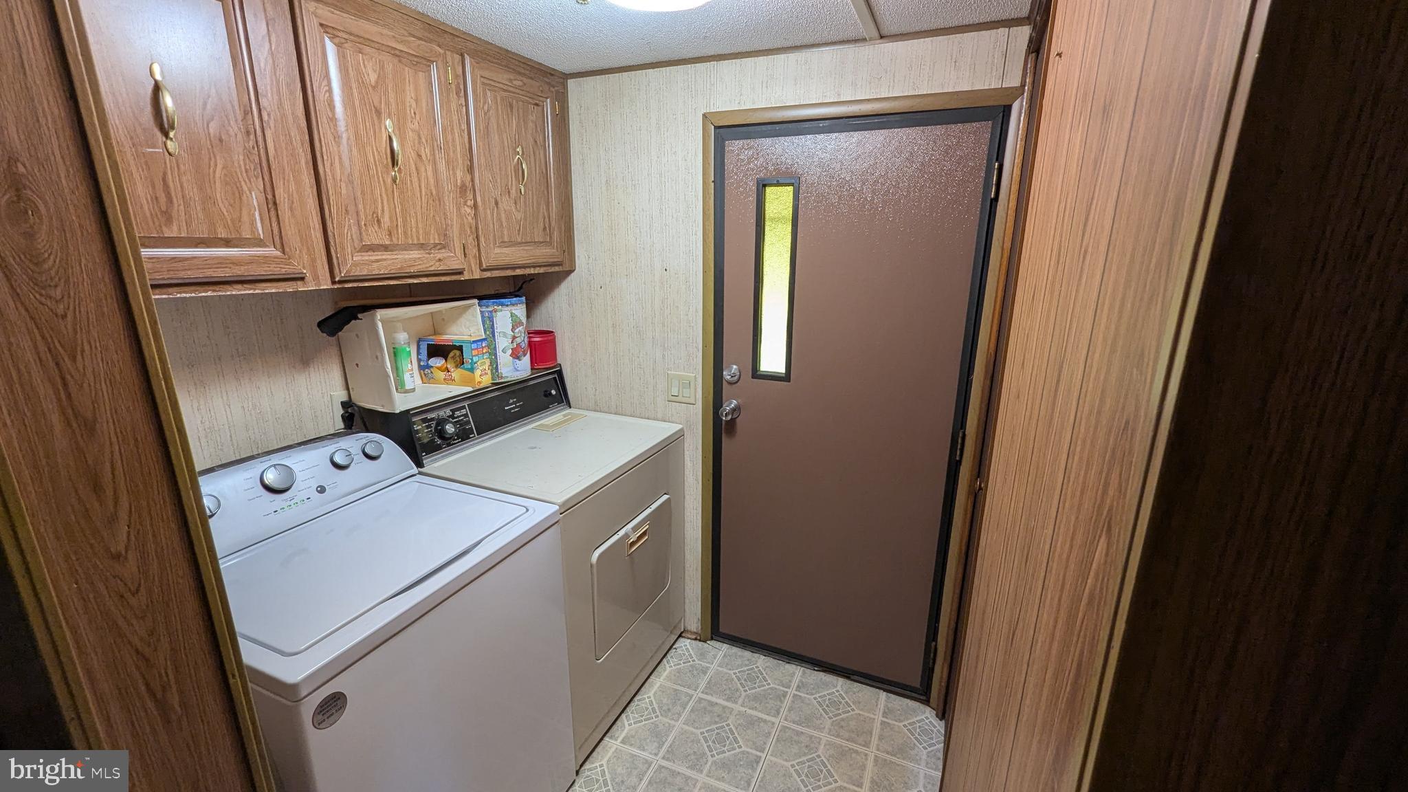 9625 Airport Road Seaford, DE 19973 - Photo 18 of 31 a utility room with dryer and washer