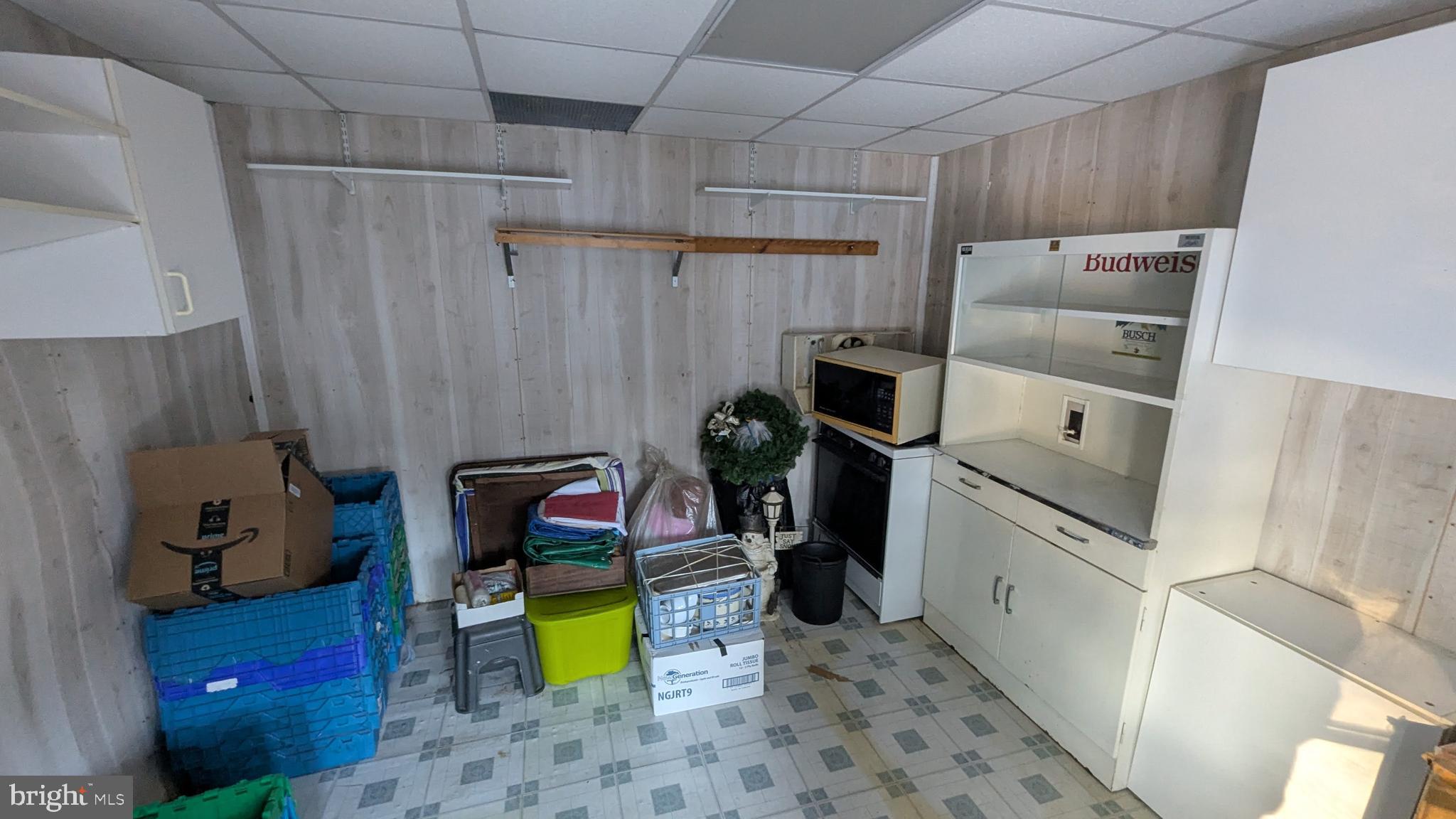 9625 Airport Road Seaford, DE 19973 - Photo 24 of 31 a room with storage and utility