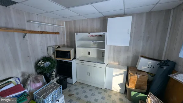 a view of a barn in the middle of a yard