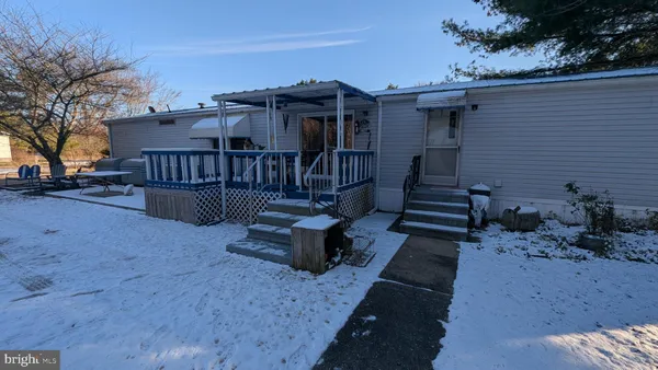 a outdoor dining space with furniture