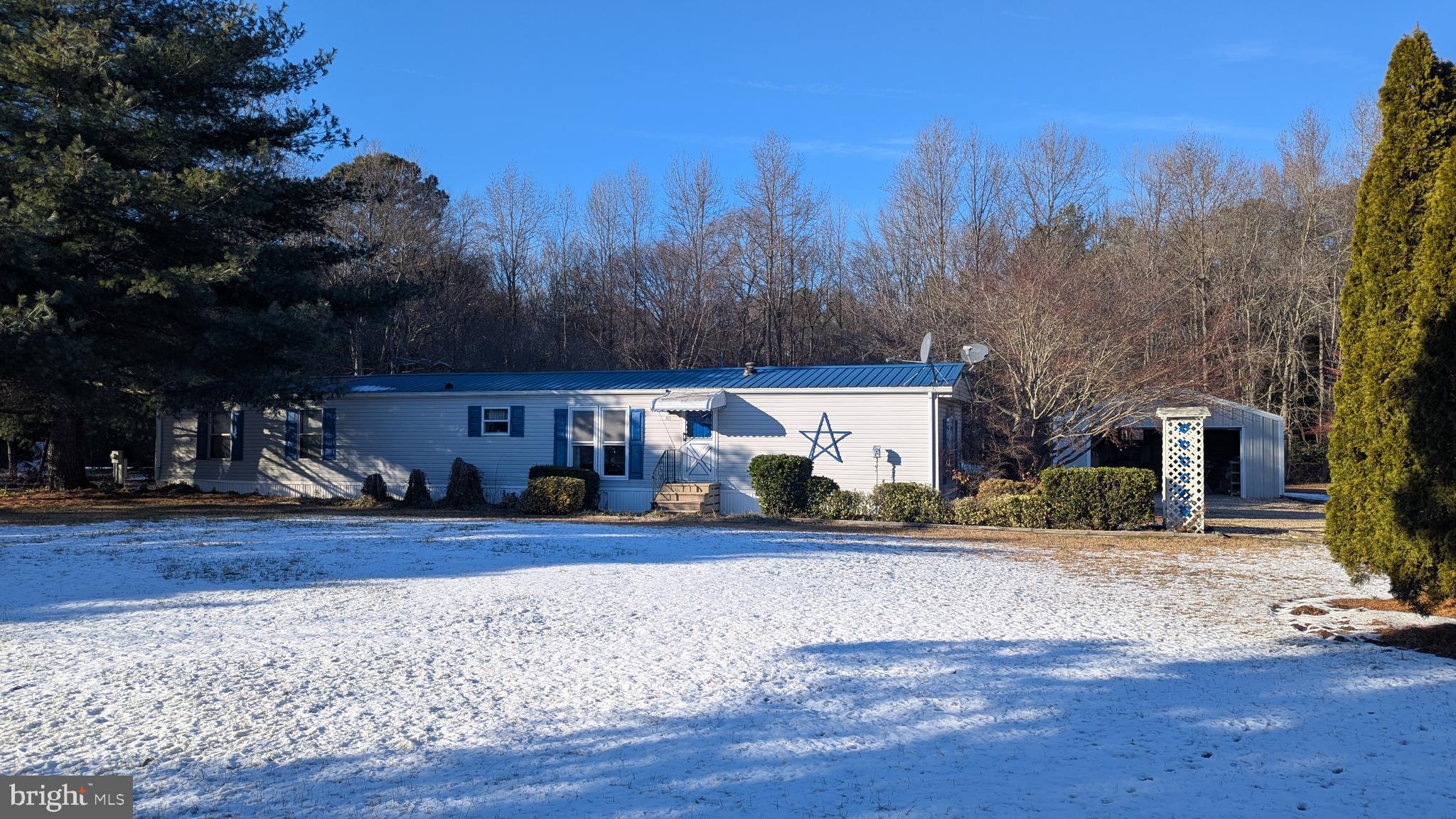 9625 Airport Road Seaford, DE 19973 - Photo 3 of 31 a view of a house with a yard