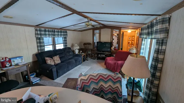 a kitchen with a sink a stove and cabinets