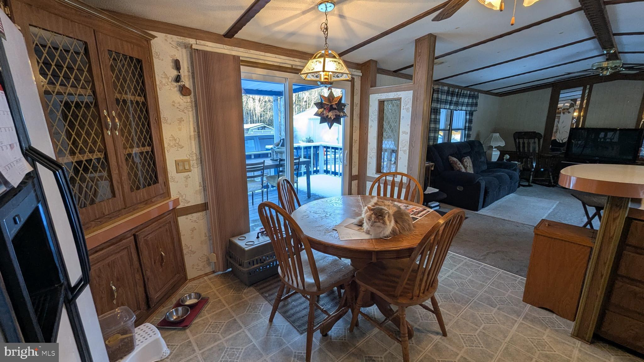 9625 Airport Road Seaford, DE 19973 - Photo 9 of 31 a dining room with furniture and window