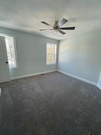 39 Staples Street Billerica, MA 01821 - Photo 17 of 25 a view of an empty room with a window