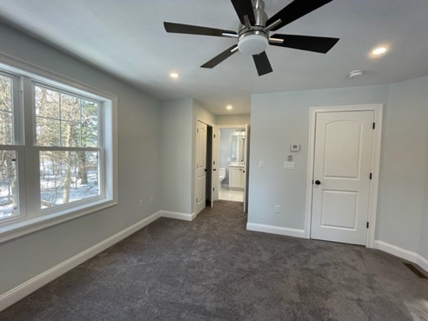 39 Staples Street Billerica, MA 01821 - Photo 19 of 25 a view of an empty room with a window