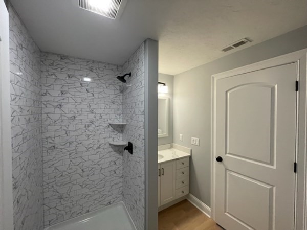 39 Staples Street Billerica, MA 01821 - Photo 22 of 25 a bathroom with a shower and a sink