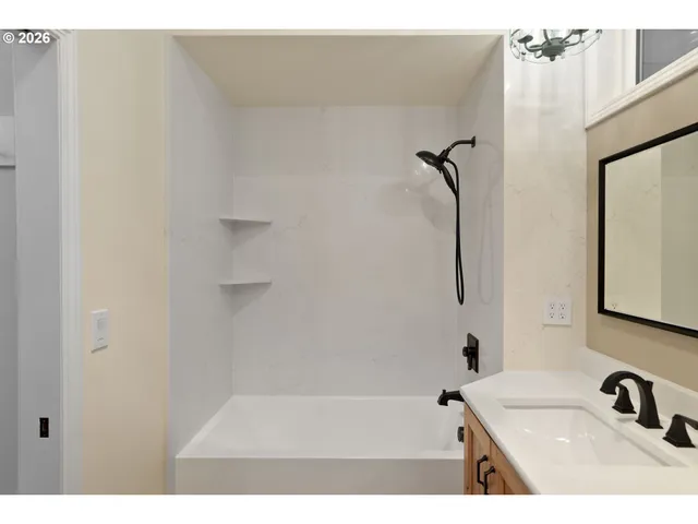 a view of entryway with bathroom