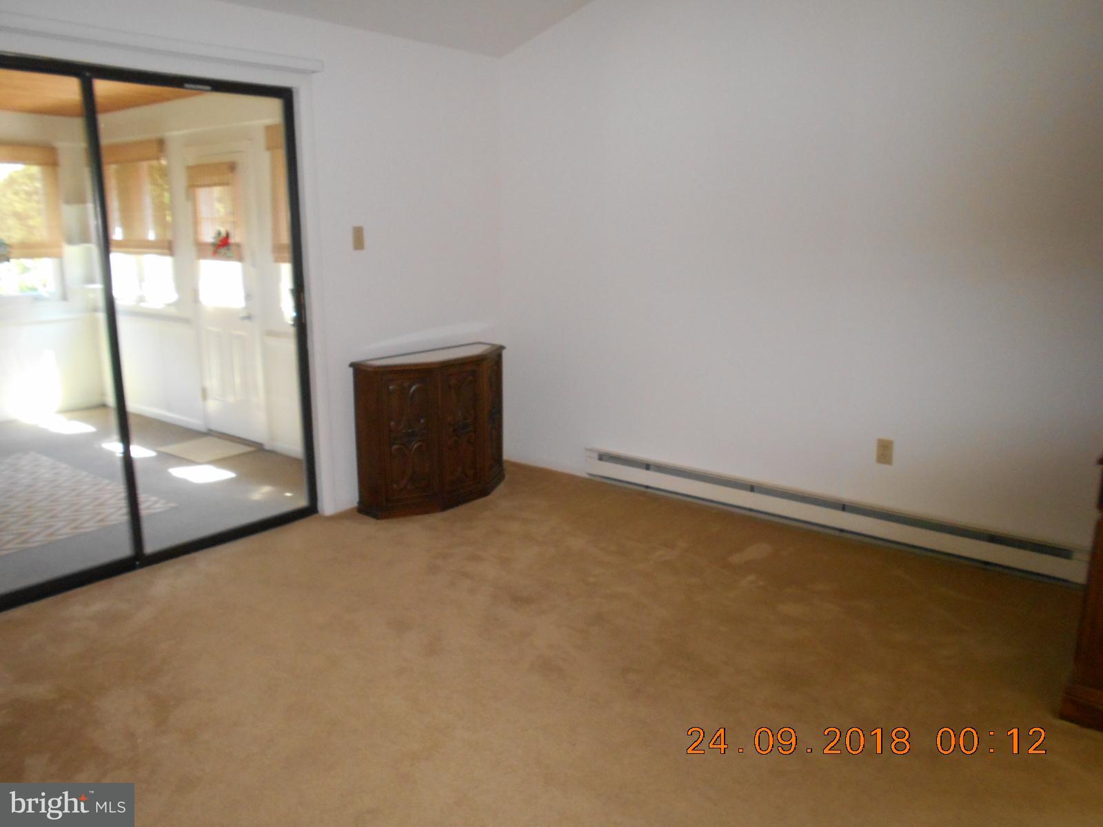 506 Harbor Road Ocean View, DE 19970 - Photo 5 of 30 Dining area, leading to enclosed porch