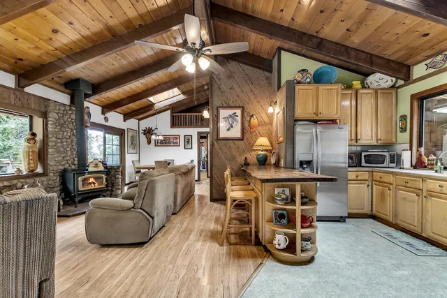 a bathroom with a sink mirror and toilet