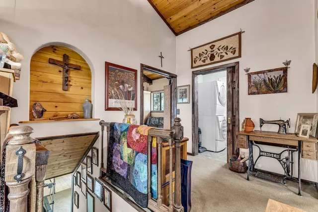 a view of livingroom with furniture and a window