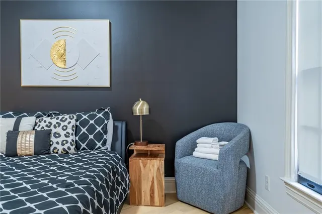 a bathroom with a double vanity sink mirror and shower