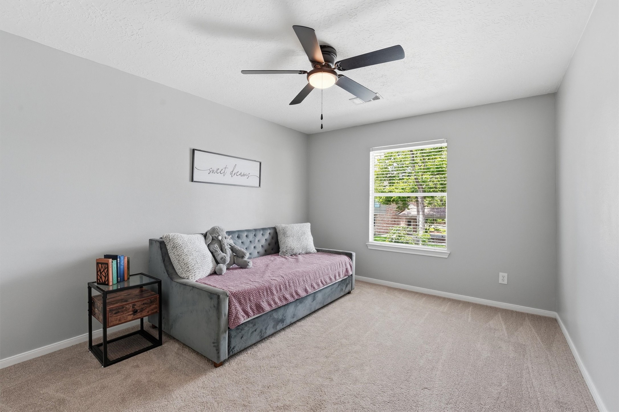 8827 Mile Run Road Humble, TX 77346 - Photo 22 of 37 a living room with furniture and a window