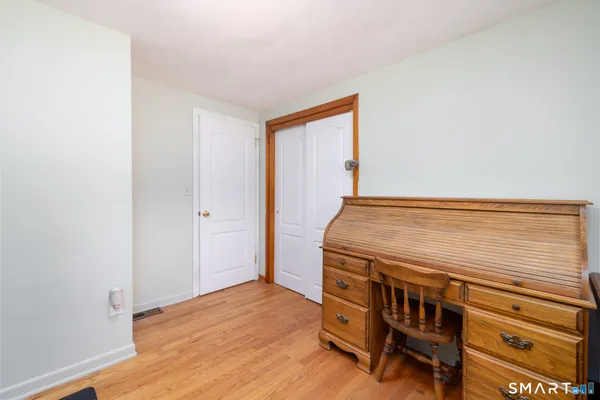 a view of livingroom with furniture and wooden floor