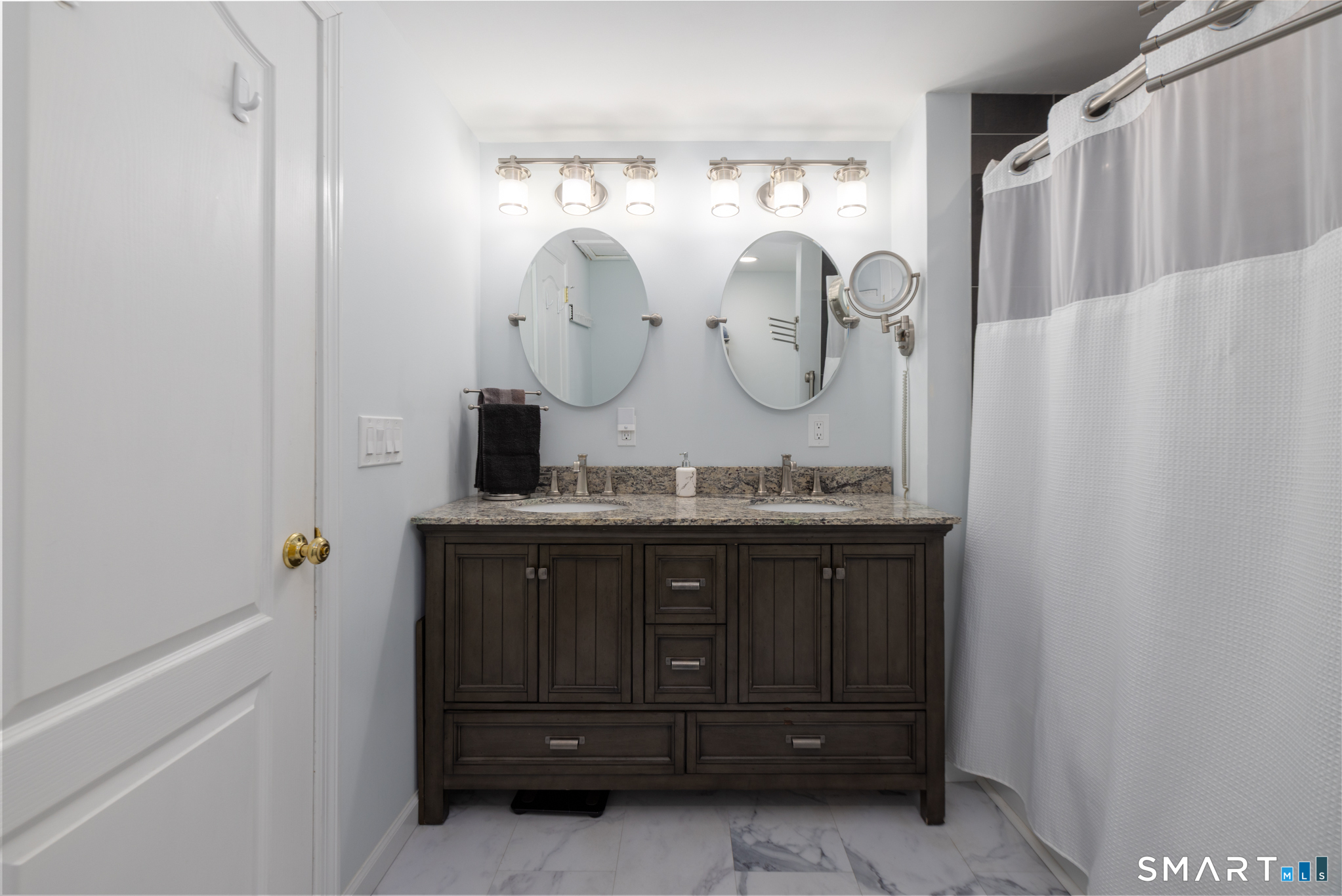 351 Platt Hill Road Winchester, CT 06098 - Photo 22 of 40 a bathroom with a granite countertop sink a mirror and a shower curtain