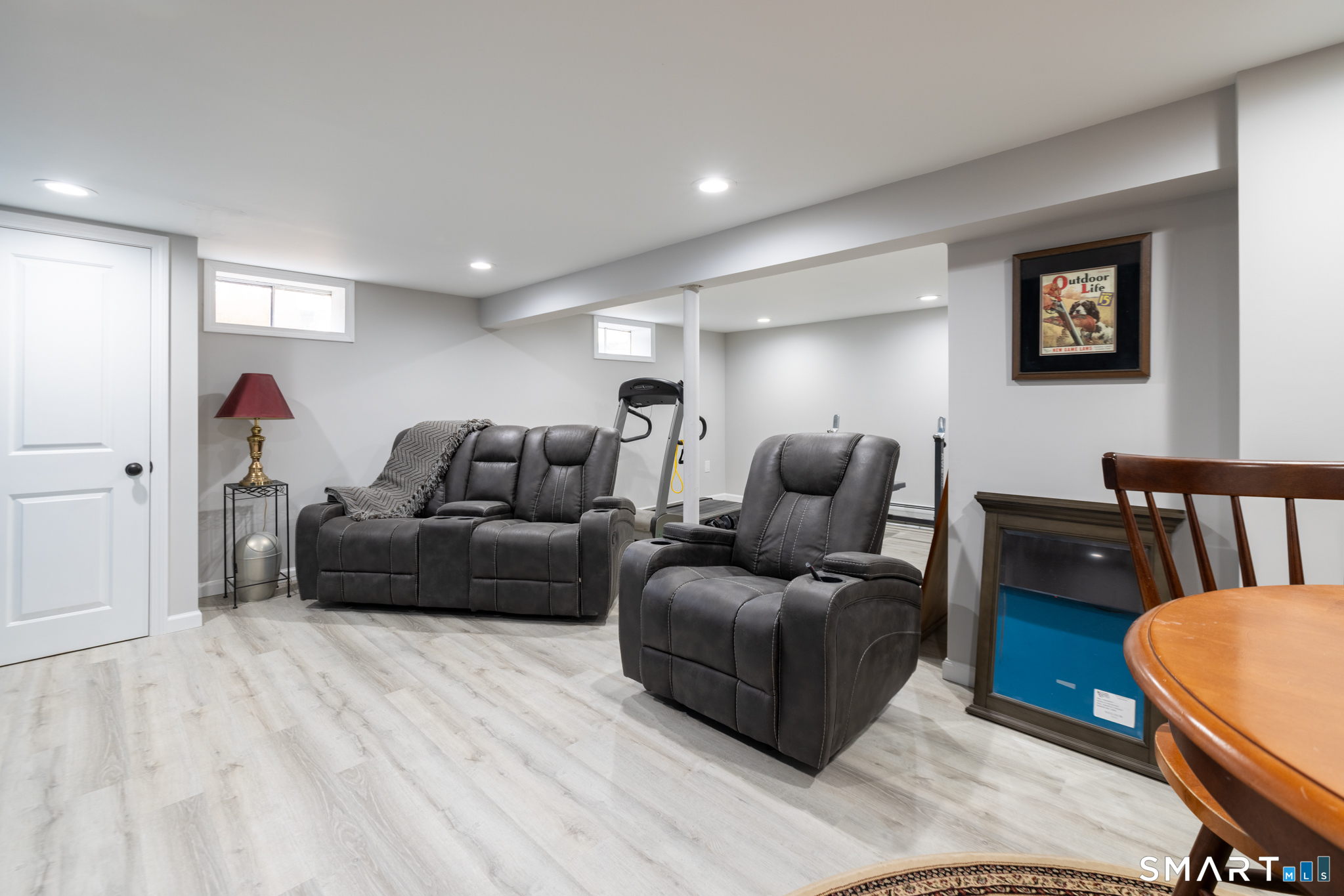 351 Platt Hill Road Winchester, CT 06098 - Photo 24 of 40 a living room with furniture and a wooden floor